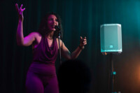 electro voice portable speaker woman performing on stage
